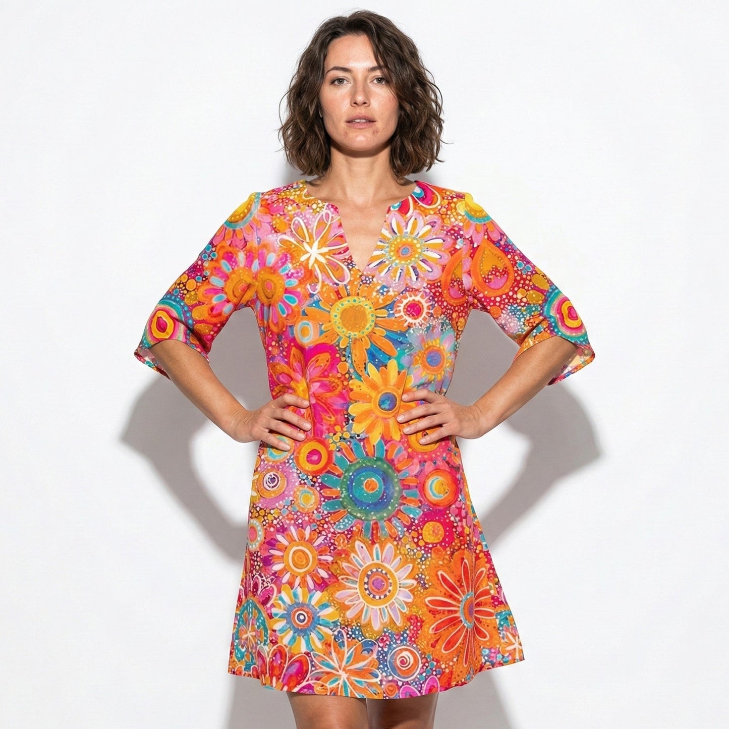 Women's mini dress with V-neck and floral pattern