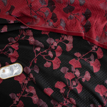 Herbstglanz Wendedecke – Baumwollquilt mit Gingko-Blatt-Muster in Orange