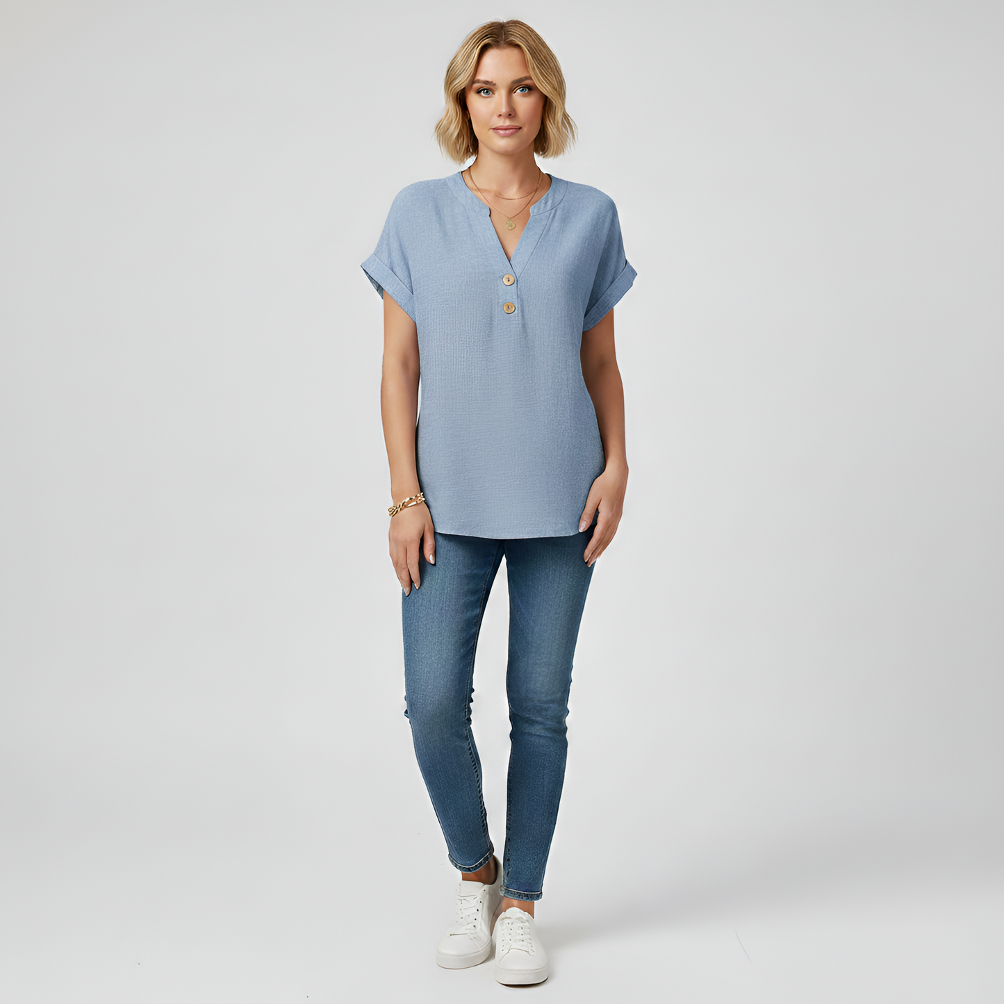 Damenbluse aus Baumwolle mit V-Ausschnitt und kurzen Ärmeln