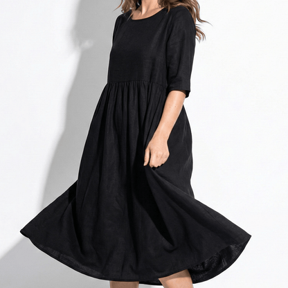 Women's midi dress with round neckline and side pockets