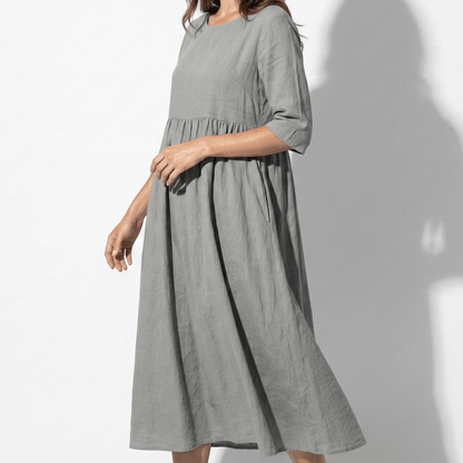 Women's midi dress with round neckline and side pockets