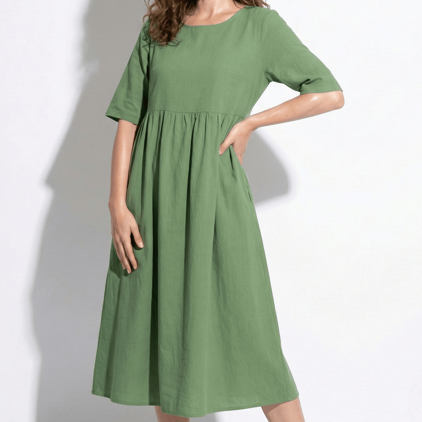 Women's midi dress with round neckline and side pockets