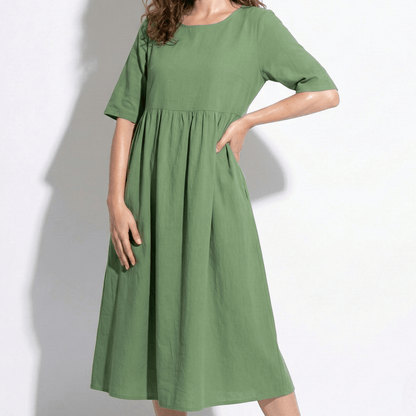 Women's midi dress with round neckline and side pockets