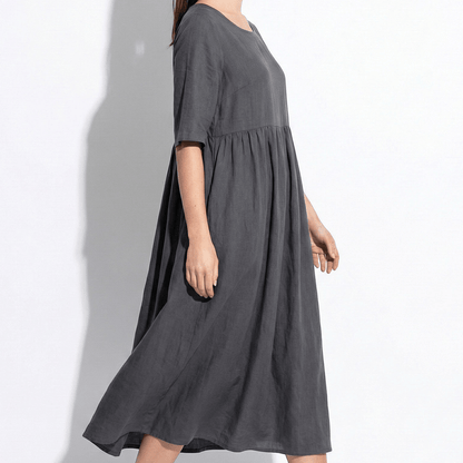 Women's midi dress with round neckline and side pockets