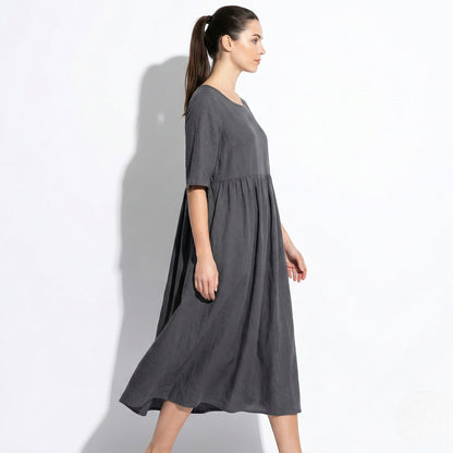 Women's midi dress with round neckline and side pockets