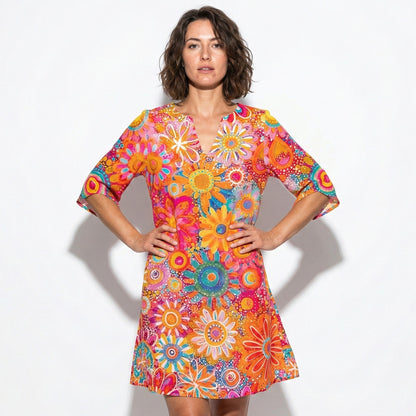 Women's mini dress with V-neck and floral pattern